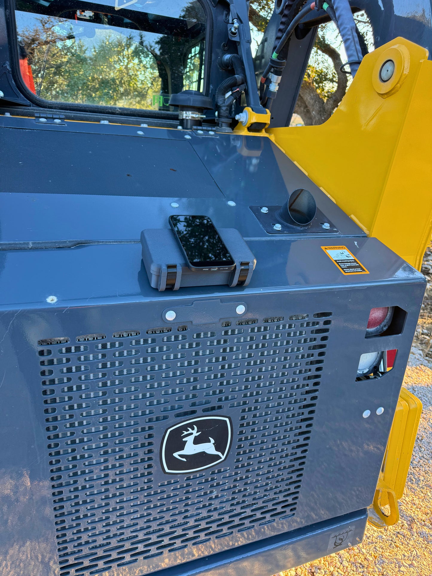 Magnetic storage box on John Deere