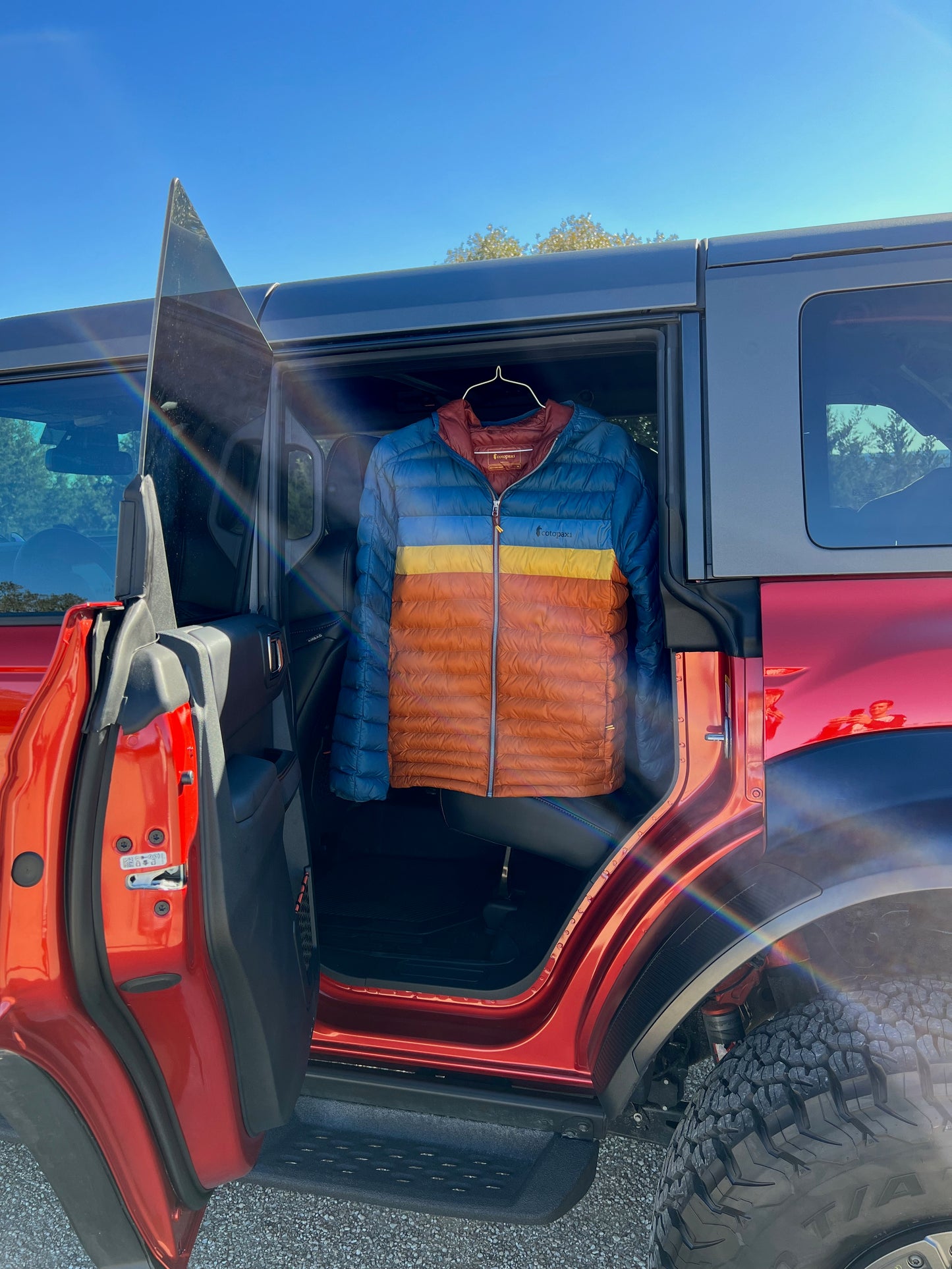 Garment hanging from door of Ford Bronco